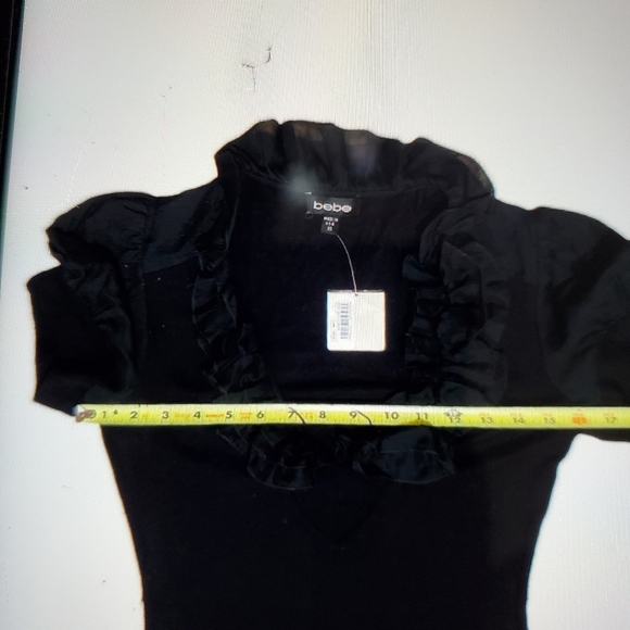 Bebe NWOT Puff Sleeve Ruffle Dress — (tag fell off). Never worn - Picture 5 of 11